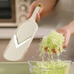 Feliator și tocător de varză | Ustensilă de bucătărie durabilă din oțel inoxidabil pentru prepararea salatelor | Mâner ergonomic, răzătoare și tăietor eficient de legume | Ideal pentru varză, castraveți, morcovi | Include recipient de depozitare | Perfect pentru gătit acasă - Image 5