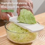 Feliator și tocător de varză | Ustensilă de bucătărie durabilă din oțel inoxidabil pentru prepararea salatelor | Mâner ergonomic, răzătoare și tăietor eficient de legume | Ideal pentru varză, castraveți, morcovi | Include recipient de depozitare | Perfect pentru gătit acasă - Image 3